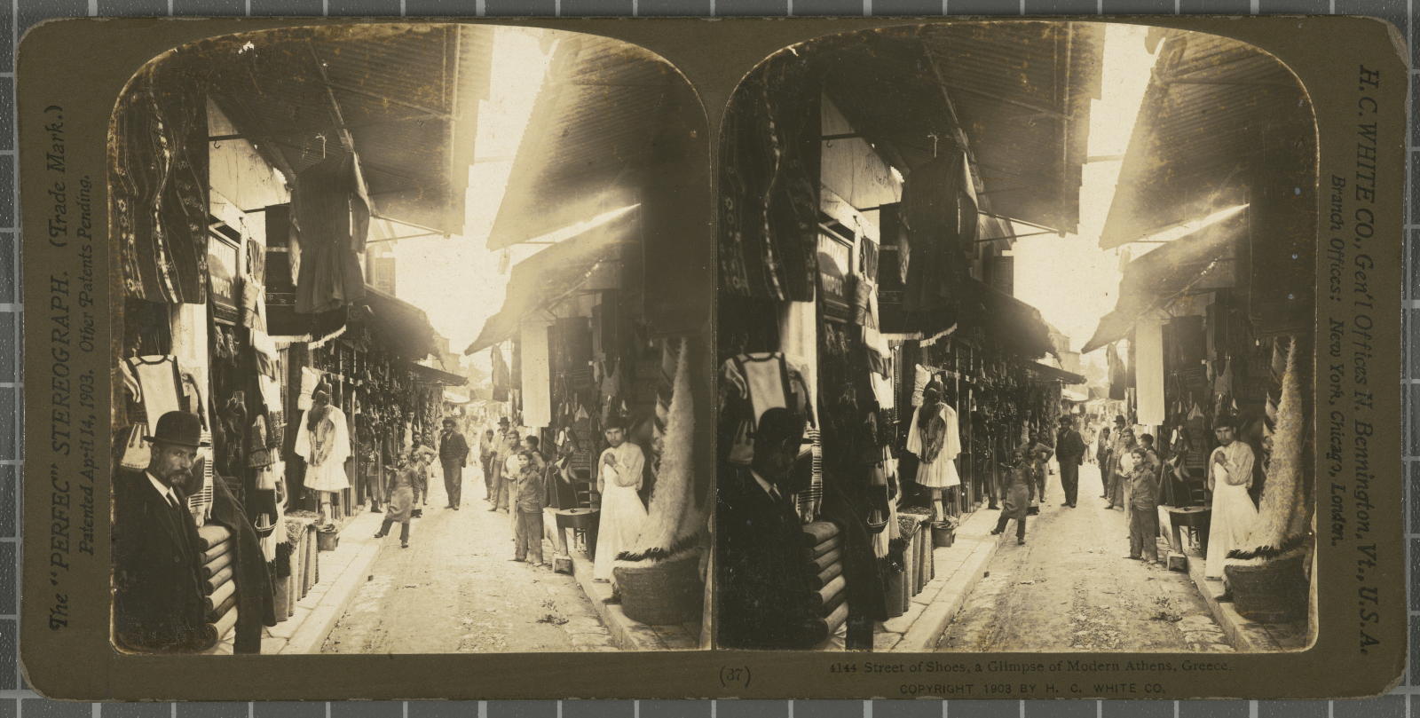 Desconegut, Street of Shoes, a Glimpse of Modern Athens, Greece. White, H.C. & Co., The "Perfec" Stereograph
